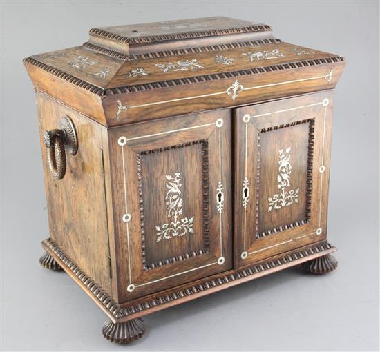 A mid 19th century mother of pearl inlaid rosewood toiletry box, height 13in.